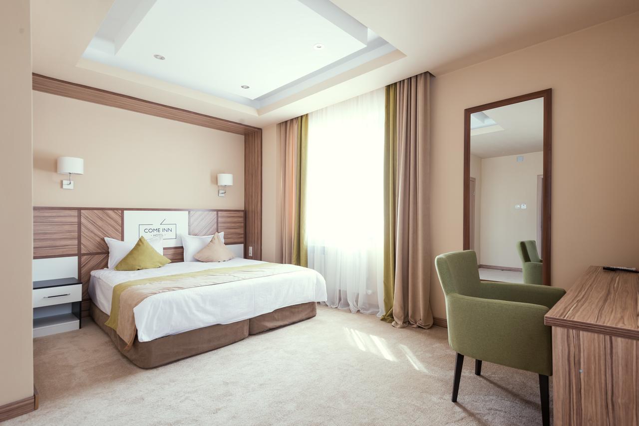 Come Inn Astana Bagian luar foto