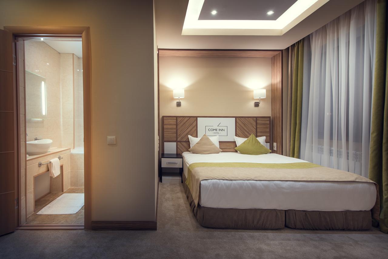 Come Inn Astana Bagian luar foto