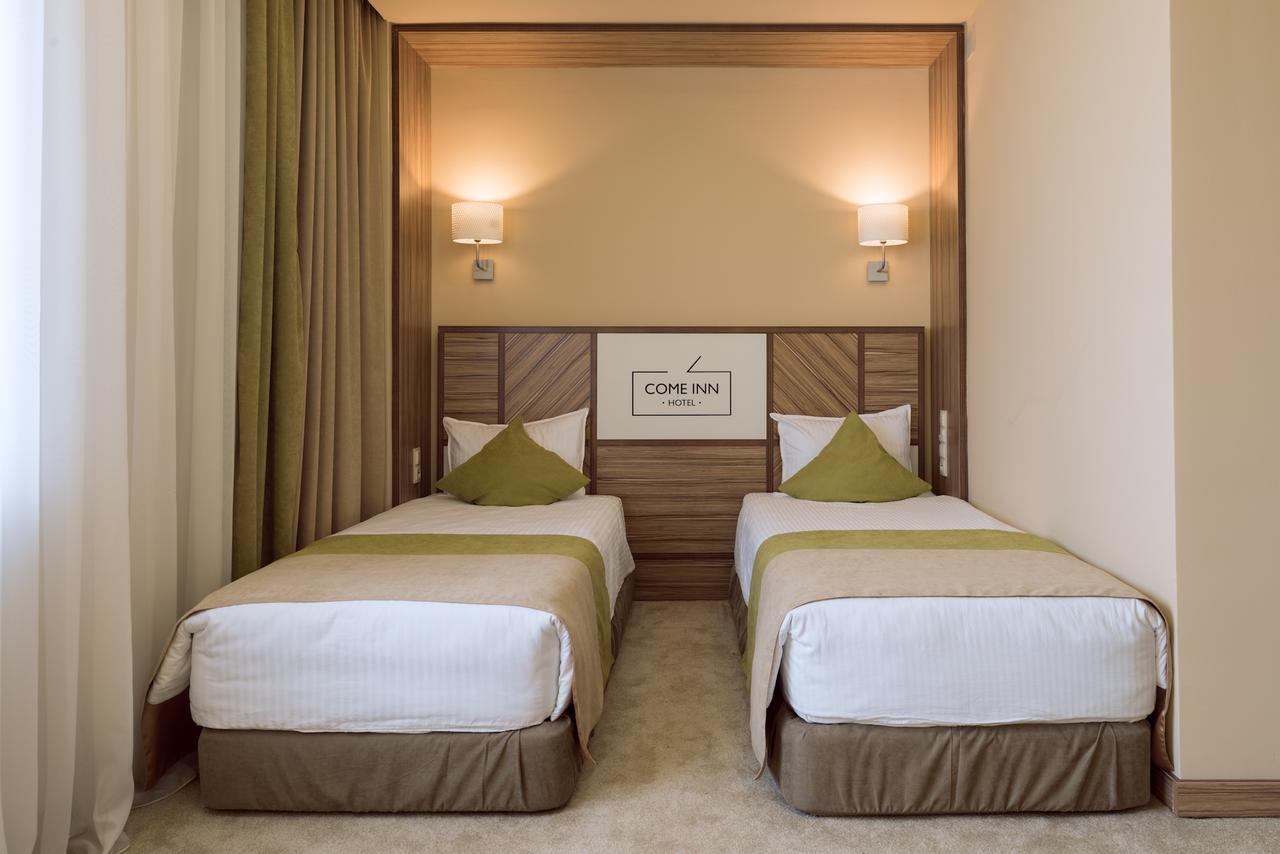 Come Inn Astana Bagian luar foto