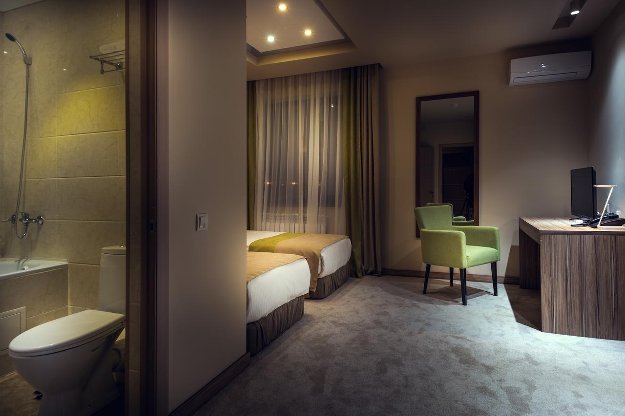 Come Inn Astana Bagian luar foto